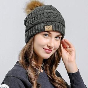 klv Gray knit style beanie with faux fur Pom.